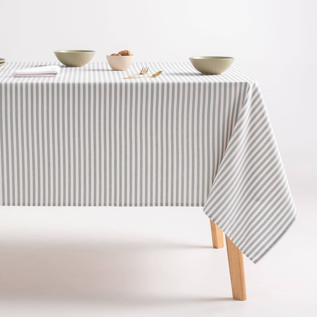 Nappe rayée résistante aux taches en coton polyester GAMUSI, 140 cm, avec motifs colorés sur surface en tissu.