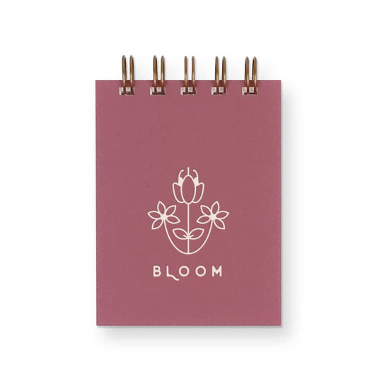 Mini carnet Bloom Jotter de Ruff House Print Shop avec couverture florale colorée sur fond blanc